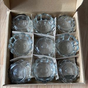 - 18 glass votive holders!